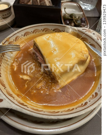 A cross-section of a Francesinha I ate in Porto, Portugal. A cross-section of a Francesinha I ate in Porto, Portugal. 139929473