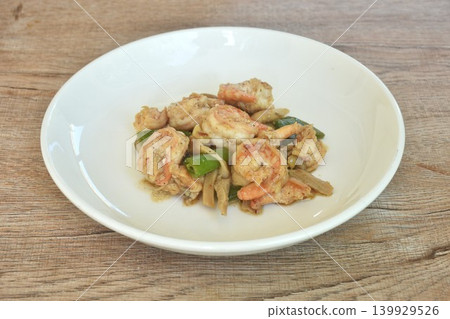 stir fried green pea and mushroom topping shrimp in soybean sauce on plate stir fried green pea and mushroom topping shrimp in soybean sauce on plate 139929526