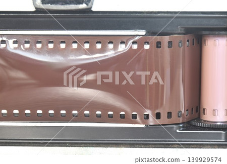 negative film loading on single lens reflect in back cover 139929574