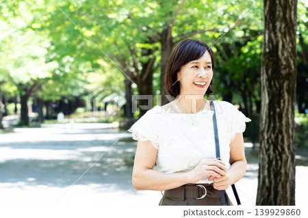 middle-aged women commuting to work middle-aged women commuting to work 139929860