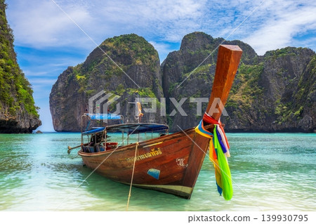 Maya Beach Thailand with Traditional Longtail Boat and Turquoise Sea Maya Beach Thailand with Traditional Longtail Boat and Turquoise Sea 139930795