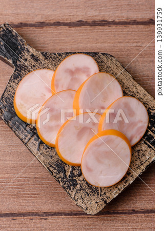 Slices of cooked chicken sausage for sandwiches and antipasto for dinner. Sausage slices Slices of cooked chicken sausage for sandwiches and antipasto for dinner. Sausage slices 139931759