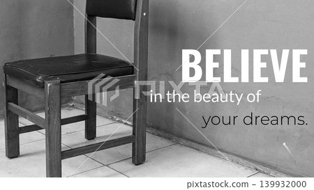 A black and white image of an empty wooden chair sitting on a tiled floor next to a worn, textured wall. A quote is superimposed "BELIEVE in the beauty of your dreams." A black and white image of an empty wooden chair sitting on a tiled floor next to a worn, textured wall. A quote is superimposed "BELIEVE in the beauty of your dreams." 139932000