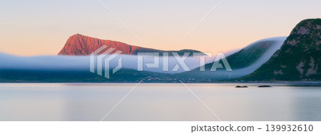 Panoramic view on the fjord during midnight sun in Lofoten islands, Norway. Panoramic view on the fjord during midnight sun in Lofoten islands, Norway. 139932610