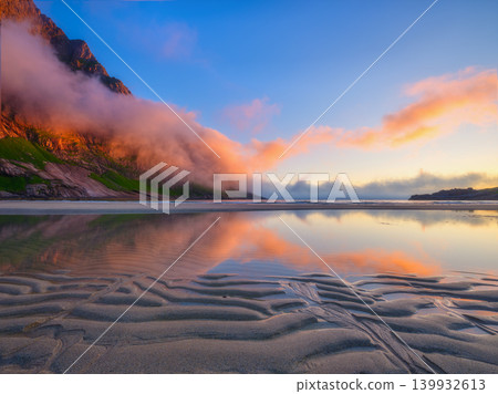 Norwegian arctic fjord at midnight sun. Horseid beach, Lofoten Islands, Norway.  139932613