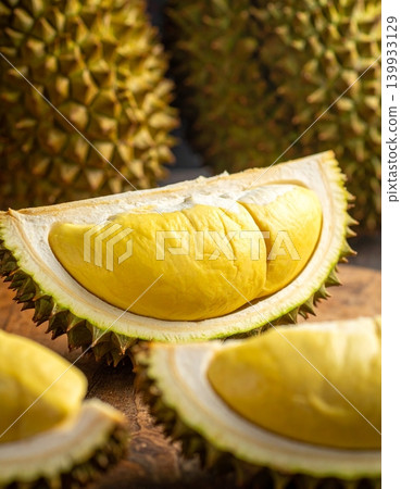 Durian riped and fresh durian peel with yellow colour fruit Durian riped and fresh durian peel with yellow colour fruit 139933129