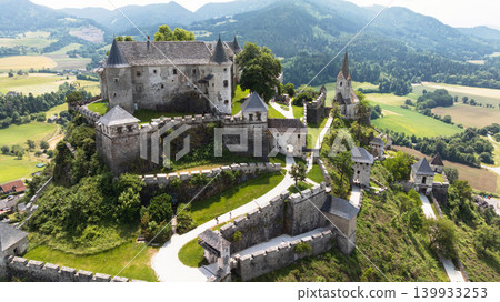 Drone view iconic Hochosterwitz Castle under summer sun Drone view iconic Hochosterwitz Castle under summer sun 139933253