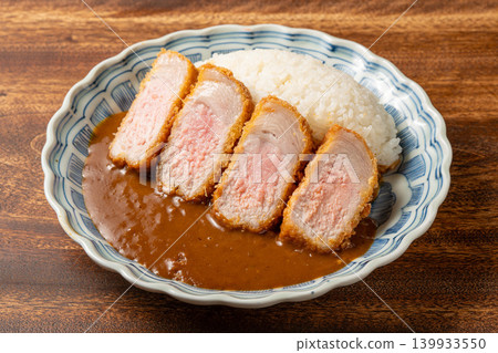 Pork loin cutlet curry: A popular curry dish topped with crispy pork loin cutlet. 139933550