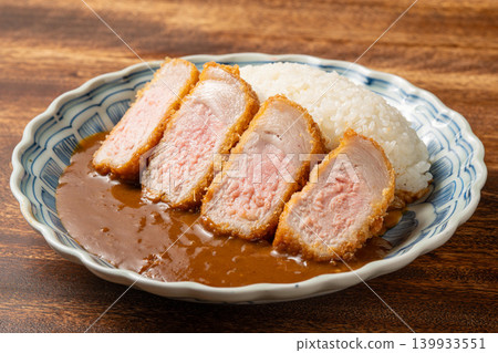 Pork loin cutlet curry: A popular curry dish topped with crispy pork loin cutlet. 139933551