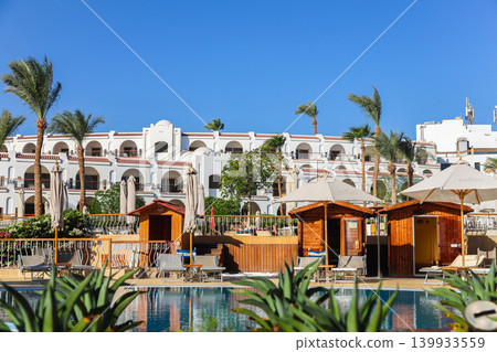 Egypt, Sharm el-Sheikh - September 25, 2025. Well-maintained area, swimming pool and beach of the Savoy Hotel. Editorial Egypt, Sharm el-Sheikh - September 25, 2025. Well-maintained area, swimming pool and beach of the Savoy Hotel. Editorial 139933559