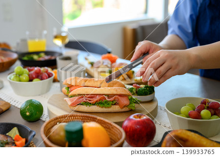 Preparing the meal on the table Preparing the meal on the table 139933765