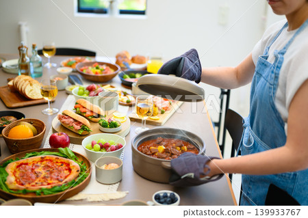 A feast laid out on the dinner table A feast laid out on the dinner table 139933767
