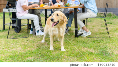 People enjoying a barbecue outdoors People enjoying a barbecue outdoors 139933850