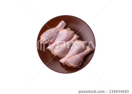 Fresh raw chicken or turkey legs for diet food. Raw chicken legs 139934093