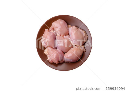 Raw chicken thigh fillet, boneless and skinless, for roasting. Raw thigh fillet Raw chicken thigh fillet, boneless and skinless, for roasting. Raw thigh fillet 139934094