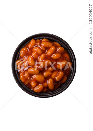 Beans in tomato sauce, a canned stew for the dinner table. Beans in tomato sauce Beans in tomato sauce, a canned stew for the dinner table. Beans in tomato sauce 139934097