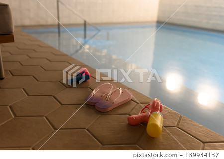 泳池邊的涼鞋和水槍 泳池邊的涼鞋和水槍 139934137