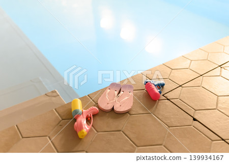 Water toys by the poolside Water toys by the poolside 139934167