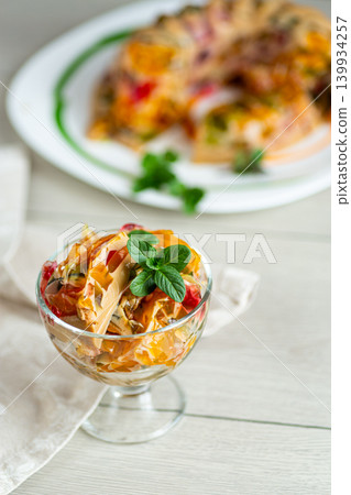 sweet gelatin dessert with coffee fruit and mint leaves 139934257