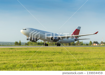 Big wide body passenger aircraft take off airport runway Big wide body passenger aircraft take off airport runway 139934459