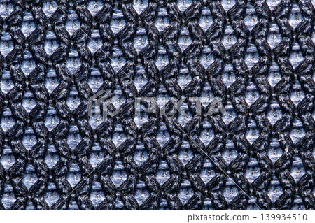 Black mesh fabric texture macro sports clothing background close up Black mesh fabric texture macro sports clothing background close up 139934510