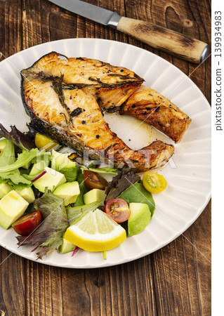 Healthy Trout Fillet Steak with Avocado and Green Salad Healthy Trout Fillet Steak with Avocado and Green Salad 139934983