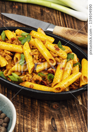 Homemade penne with fried ground meat and herbs Homemade penne with fried ground meat and herbs 139934990