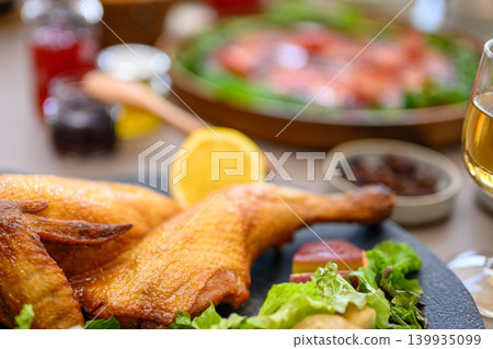 Delicious-looking roast chicken and meal Delicious-looking roast chicken and meal 139935099