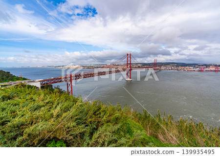Suspension bridge over Tagus River in Lisbon cityscape Suspension bridge over Tagus River in Lisbon cityscape 139935495