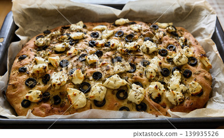Homemade Focaccia With Olives and Melted Cheese Homemade Focaccia With Olives and Melted Cheese 139935526