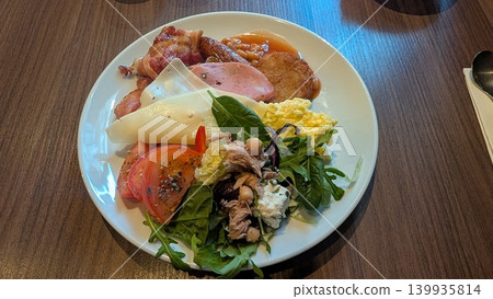 Various colorful food on a dish from breakfast buffet Various colorful food on a dish from breakfast buffet 139935814