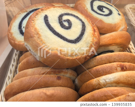 Freshly baked pastries with chocolate swirls at a local bakery Freshly baked pastries with chocolate swirls at a local bakery 139935835