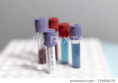 Covid 19 and Medical Test Tubes in Rack Covid 19 and Medical Test Tubes in Rack 139936270