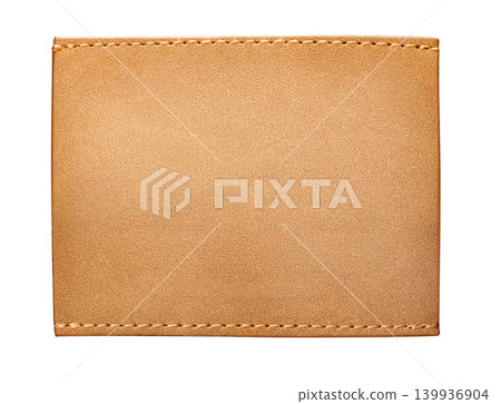Blank tan leather garment label with stitching detail Blank tan leather garment label with stitching detail 139936904