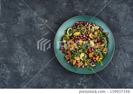 Seafood salad with fried shrimp, mussels and squid served with fresh greens Seafood salad with fried shrimp, mussels and squid served with fresh greens 139937148