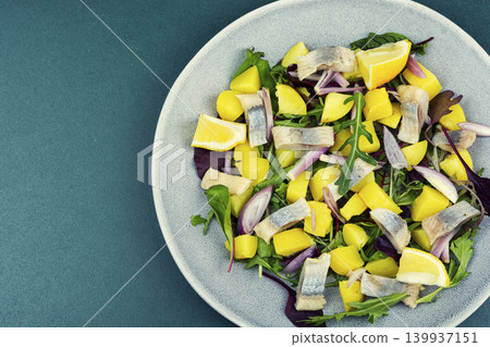 Seafood salad with herring potatoes and greens Seafood salad with herring potatoes and greens 139937151