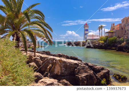 Santa Marta lighthouse on Atlantic rocky coast in Cascais Portugal 139937673