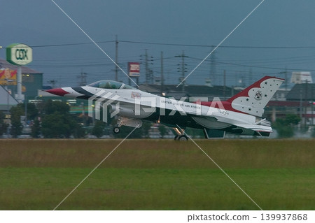 U.S. Air Force Thunderbirds landing at dusk 139937868
