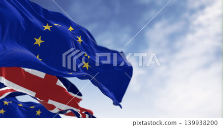 Flags of United Kingdom and the European Union waving in the wind Flags of United Kingdom and the European Union waving in the wind 139938200