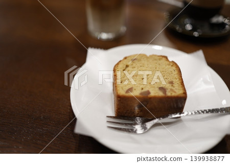 Pound cake. Slices served on a white plate, with a fork. Pound cake. Slices served on a white plate, with a fork. 139938877