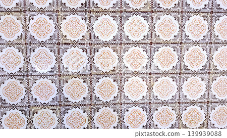 Decorative Wall of Vintage Azulejo Tiles with Brown and Ochre Geometric Motifs Decorative Wall of Vintage Azulejo Tiles with Brown and Ochre Geometric Motifs 139939088