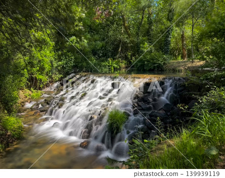 Long Exposure Waterfall Over Rocky Weir at Passadicos do Rio Uima Long Exposure Waterfall Over Rocky Weir at Passadicos do Rio Uima 139939119