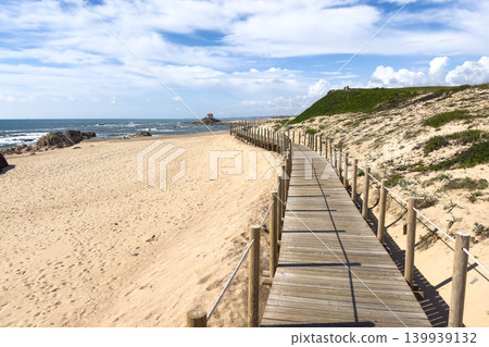 Wooden Boardwalk leading to Praia de Miramar Beach in Portugal Wooden Boardwalk leading to Praia de Miramar Beach in Portugal 139939132
