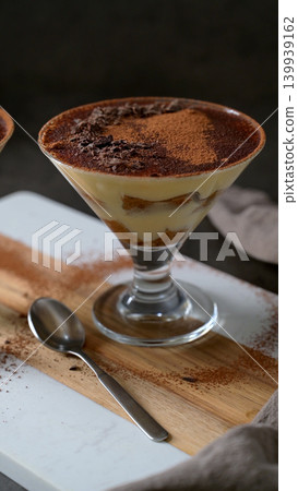 Italian Tiramisu Dessert in a Glass with Cocoa Powder and Chocolate Shavings Italian Tiramisu Dessert in a Glass with Cocoa Powder and Chocolate Shavings 139939162