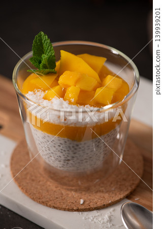 Tropical Chia Seed Pudding with Mango and Shredded Coconut Tropical Chia Seed Pudding with Mango and Shredded Coconut 139939201