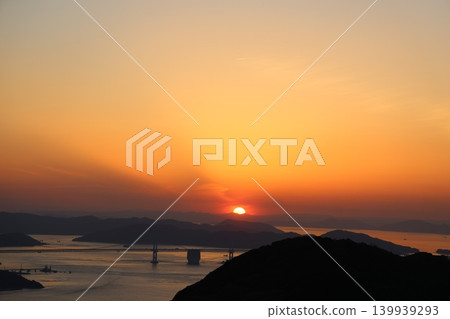 The Seto Ohashi Bridge at dusk and the sunset sky and sunset over the Seto Inland Sea 2 139939293