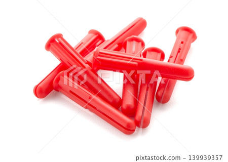 Red plastic dowels Red plastic dowels 139939357