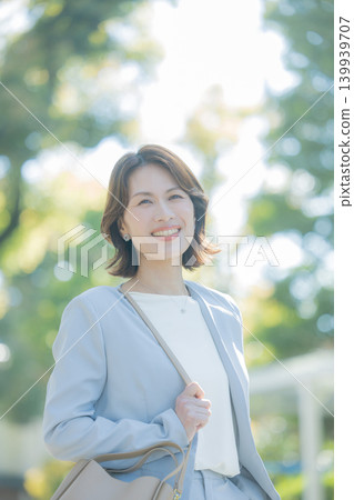 business woman commuting business woman commuting 139939707