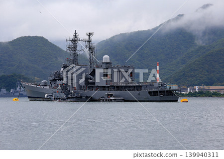Decommissioned ships and tugboats at mooring. Decommissioned ships and tugboats at mooring. 139940311
