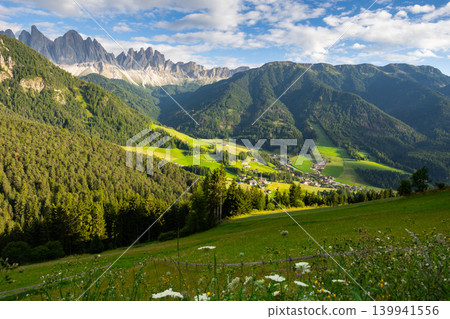 Picturesque Village of Val di Funes with Dolomite rocky mountains in Italy Picturesque Village of Val di Funes with Dolomite rocky mountains in Italy 139941556